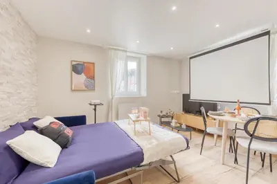 Coin salon dans l'établissement Movie Prestige - Elegant - Moderne - Netflix avec VidéoProjecteur - Stationnement facile