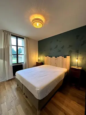 Un ou plusieurs lits dans un hébergement de l'établissement Appartement cosy N3 à 3 min de Giverny
