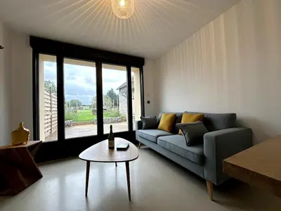 Coin salon dans l'établissement Appartement cosy N3 à 3 min de Giverny