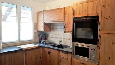 Cuisine ou kitchenette dans l'établissement La rainvilloise gite de rainvillers