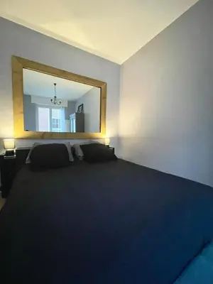 Un ou plusieurs lits dans un hébergement de l'établissement Ecrin Historique d 'Amiens Charme & Comfort Central