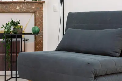 Coin salon dans l'établissement L'Écrin Normand un studio au cœur de Rouen