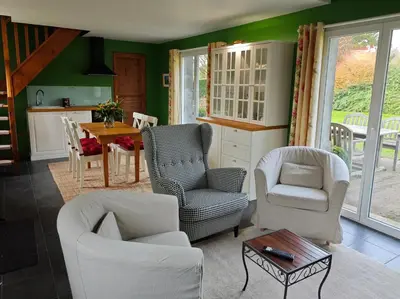 Coin salon dans l'établissement Gîte de Vallonchêne