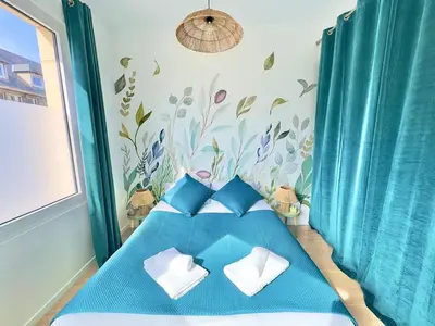 Un ou plusieurs lits dans un hébergement de l'établissement T2 Cosy Centre Ville Amiens - Rez-de-chaussée