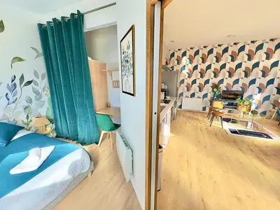 Un ou plusieurs lits dans un hébergement de l'établissement T2 Cosy Centre Ville Amiens - Rez-de-chaussée