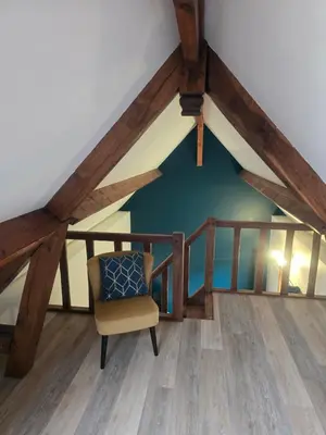 Coin salon dans l'établissement Charmante Maison au calme
