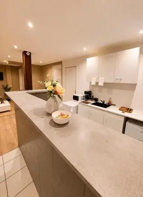 Cuisine ou kitchenette dans l'établissement Logement accueillant