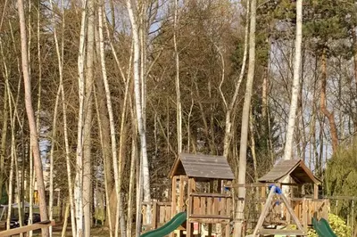 Jardin de l'établissement Appartement Le Domaine De Louis
