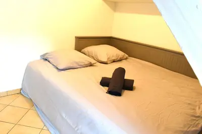 Un ou plusieurs lits dans un hébergement de l'établissement Pacy sur Eure loft en plein centre
