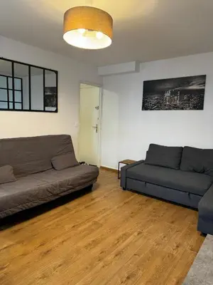 Coin salon dans l'établissement Logement au pied de la gare