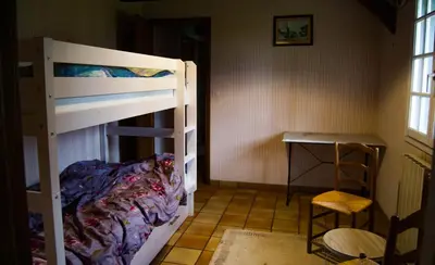 Un ou plusieurs lits dans un hébergement de l'établissement La chaumière de l'épine - Maison paisible entre forêts & plages