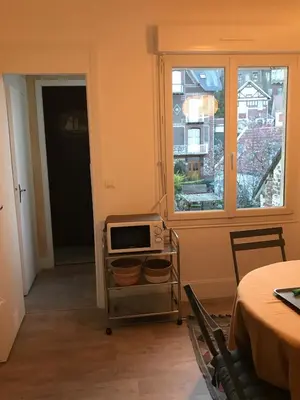 Télévision ou salle de divertissement dans l'établissement Appartement ancien cosy