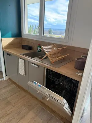 Cuisine ou kitchenette dans l'établissement Le Cocon