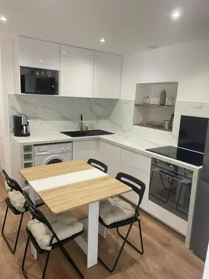 Cuisine ou kitchenette dans l'établissement Studio Les Hauteurs de Juziers