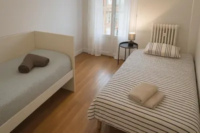 Un ou plusieurs lits dans un hébergement de l'établissement La boulange, appartement familial ou entreprise Ménage et linge inclus
