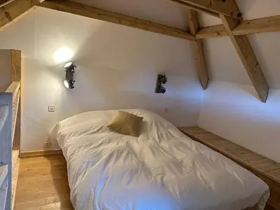 Un ou plusieurs lits dans un hébergement de l'établissement Évasion Champêtre avec Jacuzzi Havre de Paix en Normandie