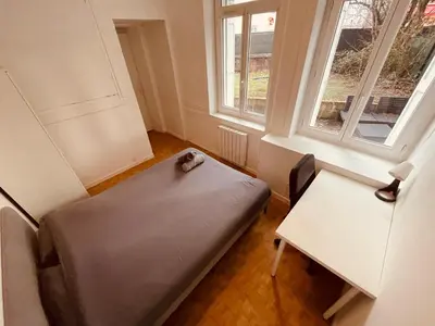 Un ou plusieurs lits dans un hébergement de l'établissement Nuit sous le Clocher - 374