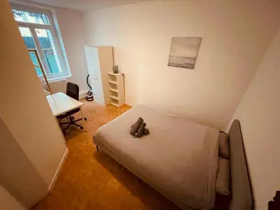 Un ou plusieurs lits dans un hébergement de l'établissement Nuit sous le Clocher - 374