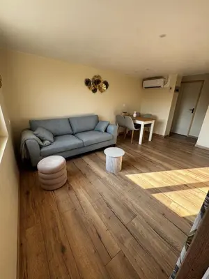 Coin salon dans l'établissement Gîte au cœur de la nature