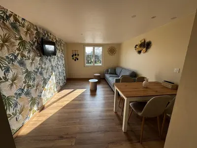 Coin salon dans l'établissement Gîte au cœur de la nature