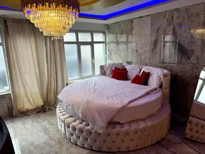 Un ou plusieurs lits dans un hébergement de l'établissement Golden house 2 - Jacuzzi