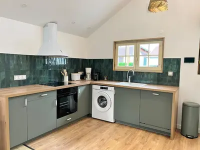 Cuisine ou kitchenette dans l'établissement Charmant chalet en bord de Seine