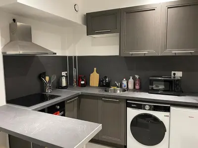 Cuisine ou kitchenette dans l'établissement Au bout du quai