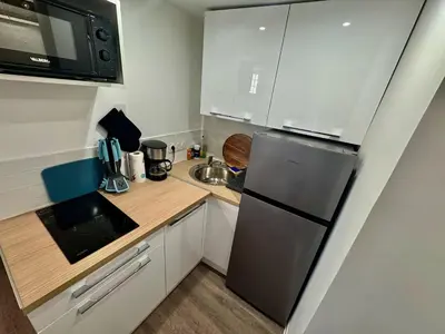 Cuisine ou kitchenette dans l'établissement Joyeuse Escale à la Gare - 368