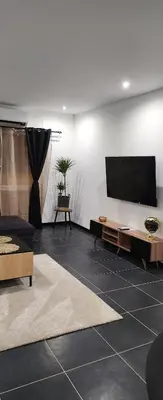 Télévision ou salle de divertissement dans l'établissement Studio mezzanine centre-ville