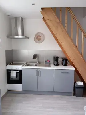 Cuisine ou kitchenette dans l'établissement La Petite Maison