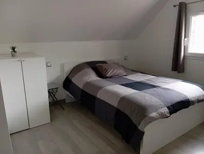 Un ou plusieurs lits dans un hébergement de l'établissement La Petite Maison