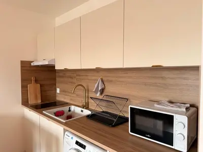 Cuisine ou kitchenette dans l'établissement Studio lumineux au cœur d'Evreux