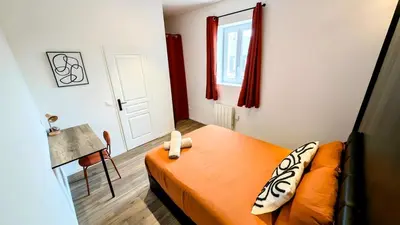 Un ou plusieurs lits dans un hébergement de l'établissement Le caviste 2ème Étage