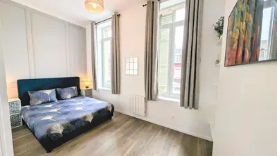 Un ou plusieurs lits dans un hébergement de l'établissement L'haussmannien 1er Étage