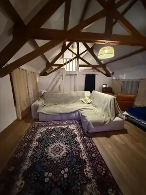 Un ou plusieurs lits dans un hébergement de l'établissement Chambre dans une Ecurie