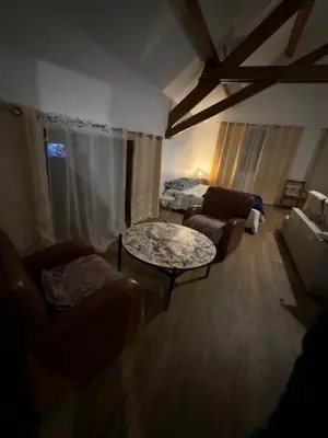 Un ou plusieurs lits dans un hébergement de l'établissement Chambre dans une Ecurie