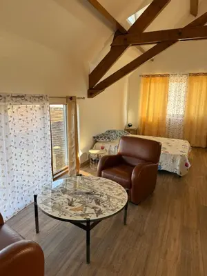 Coin salon dans l'établissement Chambre dans une Ecurie
