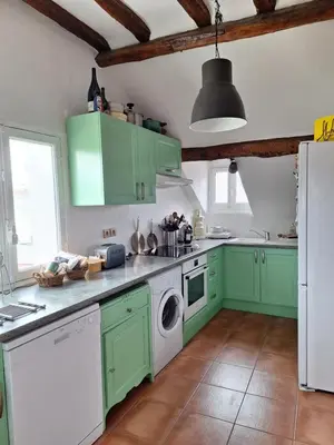 Cuisine ou kitchenette dans l'établissement Les toits de Mantes