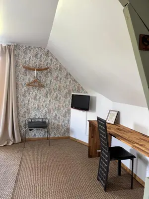 Télévision ou salle de divertissement dans l'établissement Chambres d 'hôtes Le Grand Pré