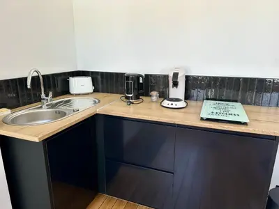 Cuisine ou kitchenette dans l'établissement Appartement proche centre ville