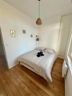Un ou plusieurs lits dans un hébergement de l'établissement Appartement proche centre ville