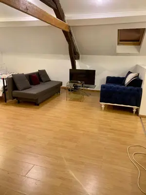 Coin salon dans l'établissement Mantes home