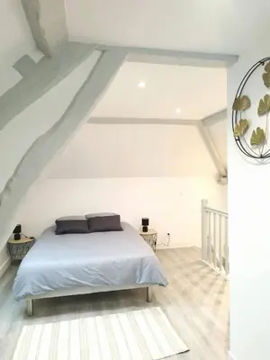 Un ou plusieurs lits dans un hébergement de l'établissement La petite maison