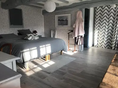 Un ou plusieurs lits dans un hébergement de l'établissement Maison Juliette