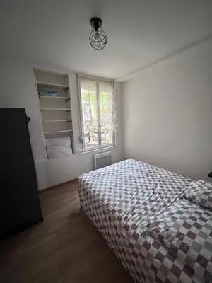 Un ou plusieurs lits dans un hébergement de l'établissement Villa Juliette