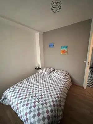 Un ou plusieurs lits dans un hébergement de l'établissement Villa Juliette