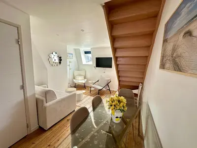 Télévision ou salle de divertissement dans l'établissement Le Duplex Appartement