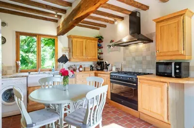 Cuisine ou kitchenette dans l'établissement Beau soleil