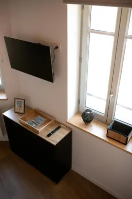 Télévision ou salle de divertissement dans l'établissement Duplex Léon - Villa Bon Accueil proche mer