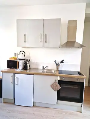 Cuisine ou kitchenette dans l'établissement Les Bons Enfants 7